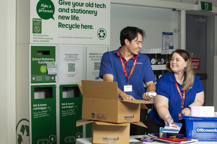 Team members sort recycling